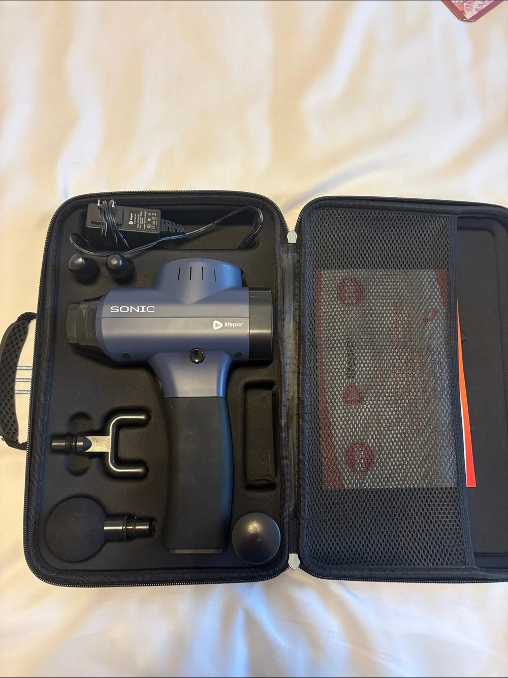 SONIC massage gun w/case. Never used